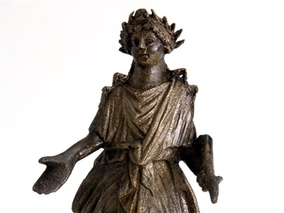 Déu Lar de bronze de la Vil·la Romana de Vilauba (Camós). S.I dC 